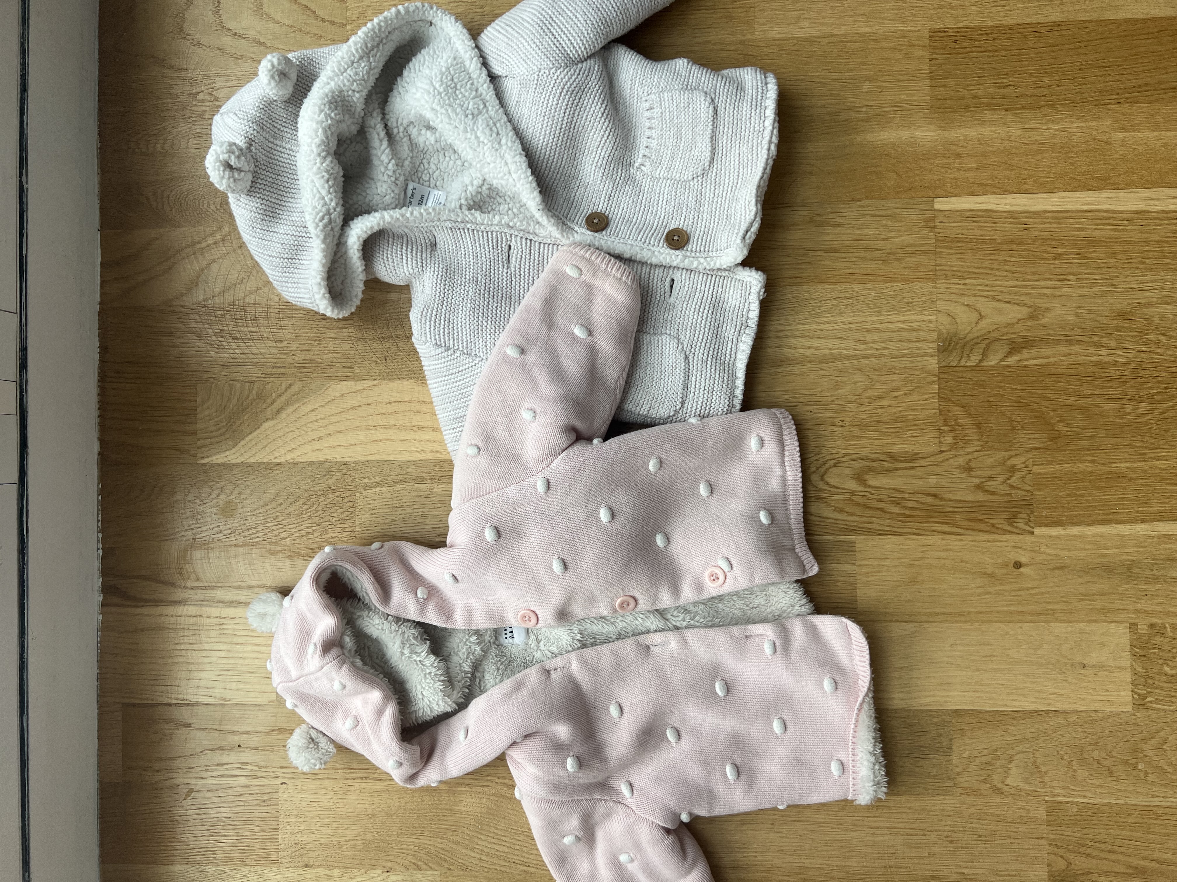 Gap cardigan, size 6–12month and Carter’s cardigan